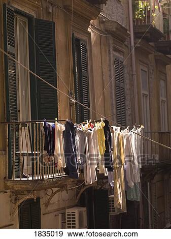 Stock Photo - Hanging laundry, Naples, Italy . Fotosearch