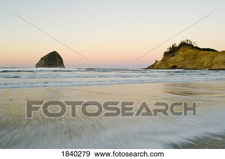 Stock Photo - Haystack Rock, Cape Kiwanda, Pacific City, Oregon, USA. Fotosearch