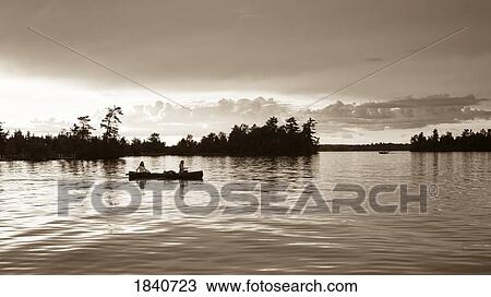 Lake of the Woods, Ontario, Canada; couple canoeing View Large Photo Image Stock Image - Lake of the Woods, Ontario, Canada; couple canoeing . Fotosearch