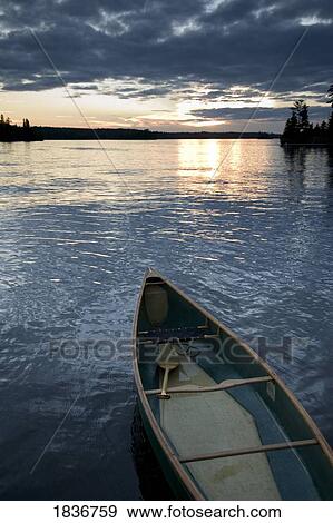Stock Photo - Lake of the Woods, Ontario, Canada; Canoe. Fotosearch