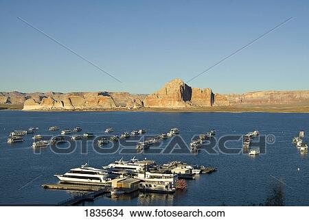 Lake Powell, USA; Man-made reservoir on the Colorado River, straddling the border between Utah and Arizona View Large Photo Image Picture - Lake Powell, USA; Man-made reservoir on the Colorado River, straddling the border between Utah and Arizona. Fotosearch
