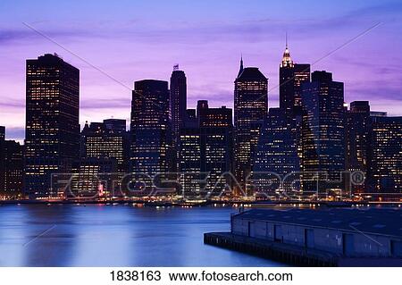 Stock Image - Lower Manhattan Skyline at twilight, New York City, New York, USA . Fotosearch