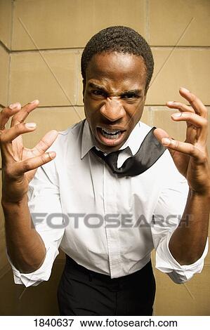 Stock Photo - Man feeling frustration. Fotosearch