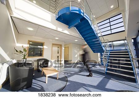 Stock Photo - Man pacing in waiting area. Fotosearch