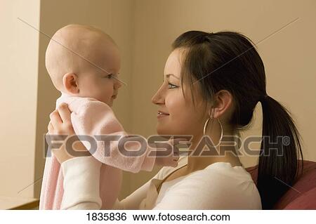 Stock Photograph - Mother and child. Fotosearch