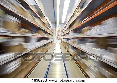 Motion blur of a warehouse conveyor belt View Large Photo Image Stock Image - Motion blur of a warehouse conveyor belt. Fotosearch