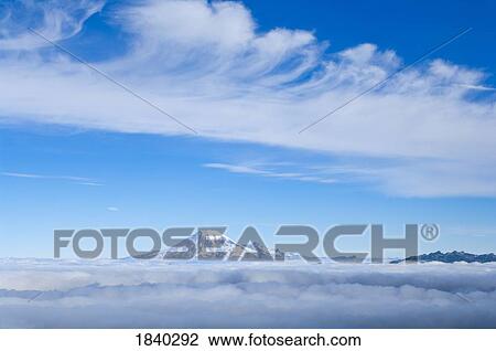 Stock Image - Mount Rainier and Foggy Valleys, Mount Adams Wilderness, Washington, USA . Fotosearch