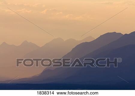 Mountains at sunset, near Radium Hot Springs, British Columbia, Canada View Large Photo Image Picture - Mountains at sunset, near Radium Hot Springs, British Columbia, Canada. Fotosearch
