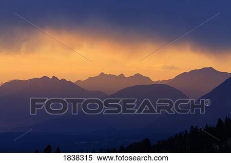 Stock Photography - Mountains at sunset, near Radium Hot Springs, British Columbia, Canada. Fotosearch