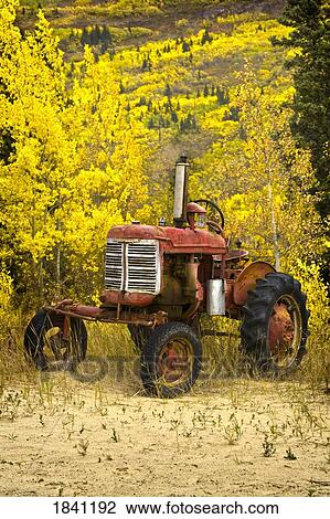 Stock Image - Old farm tractor. Fotosearch