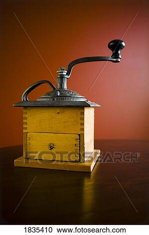 Stock Image - Old fashioned coffee grinder. Fotosearch