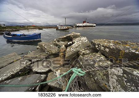 Stock Photograph - On the coast, Ardminish, Gigha, Scotland. Fotosearch