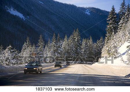 Oregon, USA; Cars driving during the winter View Large Photo Image Stock Image - Oregon, USA; Cars driving during the winter. Fotosearch