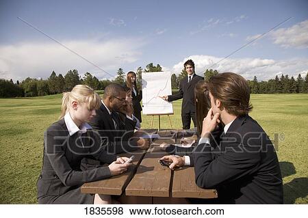 Outdoor business meeting View Large Photo Image Stock Photo - Outdoor business meeting. Fotosearch
