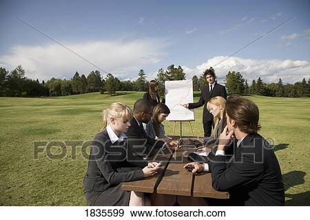 Stock Photo - Outdoor business meeting. Fotosearch