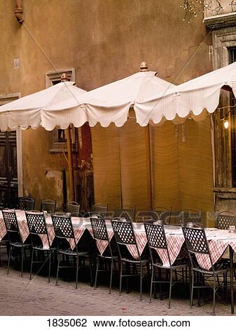 Stock Image - Outdoor patio, Rome, Italy. Fotosearch