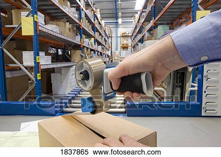 Packaging a box View Large Photo Image Stock Photography - Packaging a box. Fotosearch