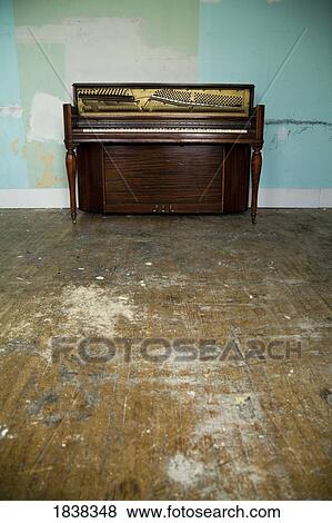 Piano in unfinished room View Large Photo Image Stock Photo - Piano in unfinished room. Fotosearch
