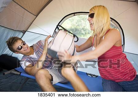 Play fighting in the tent View Large Photo Image Stock Image - Play fighting in the tent. Fotosearch