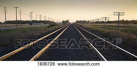 Railroad tracks, Manitoba, Canada View Large Photo Image Stock Photo - Railroad tracks, Manitoba, Canada. Fotosearch