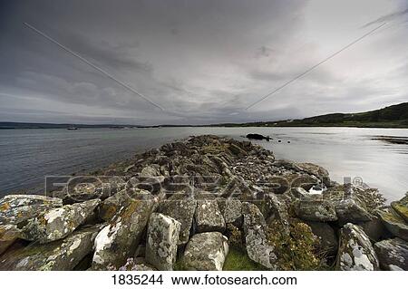 Rocks on the shore View Large Photo Image Picture - Rocks on the shore. Fotosearch