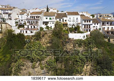 Ronda, Malaga Province, Spain; houses overlooking the Tajo gorge View Large Photo Image Stock Photo - Ronda, Malaga Province, Spain; houses overlooking the Tajo gorge . Fotosearch