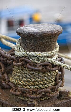 Rope and chain on post View Large Photo Image Stock Image - Rope and chain on post. Fotosearch