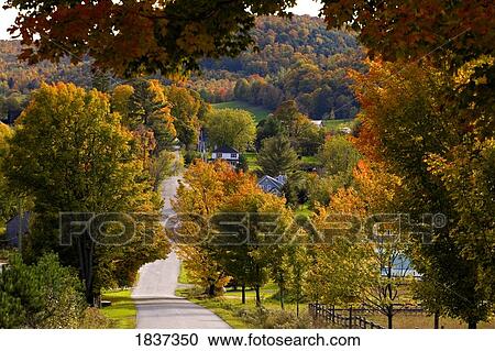 Stock Image - Rural road, Quebec, Canada. Fotosearch