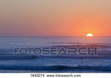Setting sun, Pacific City, Oregon, USA View Large Photo Image Picture - Setting sun, Pacific City, Oregon, USA . Fotosearch