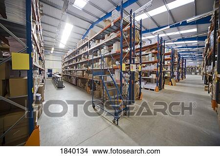 Shelving in a warehouse View Large Photo Image Picture - Shelving in a warehouse. Fotosearch