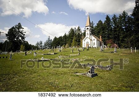 Small church and cemetery View Large Photo Image Stock Image - Small church and cemetery. Fotosearch