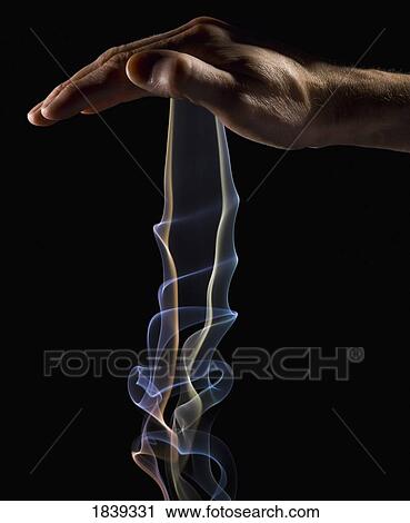 Smoke wisps from a hand View Large Photo Image Stock Image - Smoke wisps from a hand. Fotosearch