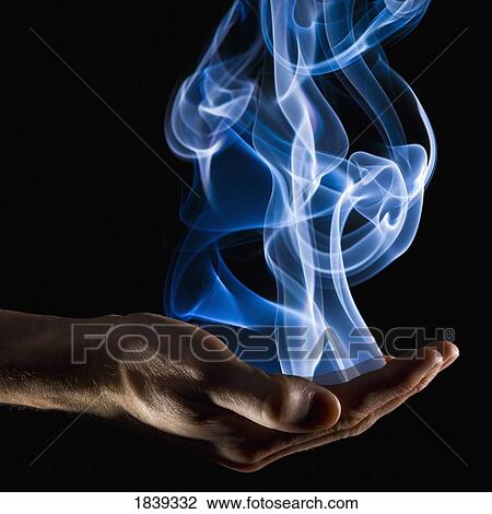 Smoke wisps from a hand View Large Photo Image Stock Image - Smoke wisps from a hand. Fotosearch