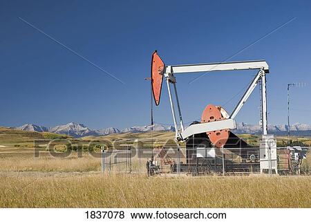 Stock Photo - Southern Alberta, Canada; Oil pump near Longview. Fotosearch