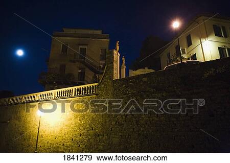 Stone wall and buildings, Montalcino, Italy View Large Photo Image Stock Photo - Stone wall and buildings, Montalcino, Italy. Fotosearch