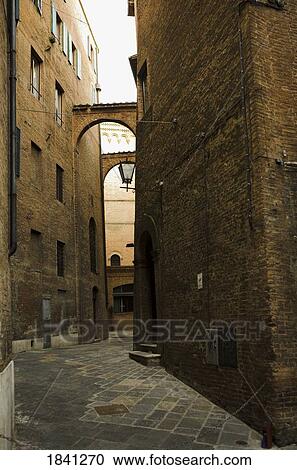 Stock Image - Street of Siena, Tuscany, Italy. Fotosearch