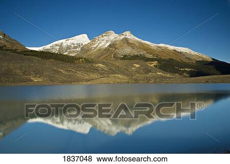 Stock Photo - Sunwapta Lake, Jasper National Park, Canada . Fotosearch