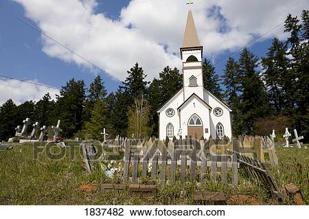 Tiny church and cemetery View Large Photo Image Stock Image - Tiny church and cemetery. Fotosearch