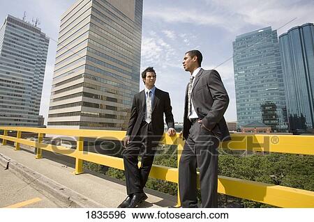 Stock Photograph - Two businessmen. Fotosearch