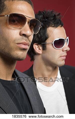 Two men in sunglasses View Large Photo Image Stock Photograph - Two men in sunglasses. Fotosearch