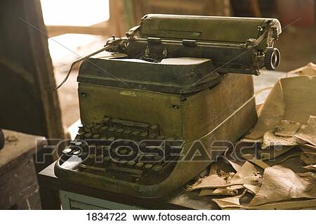 Stock Image - Type writer, and leather products. Fotosearch