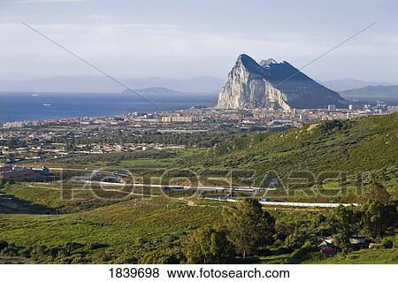 Stock Photo - View to Gibraltar with Morocco behind, Cadiz Province, Spain. Fotosearch