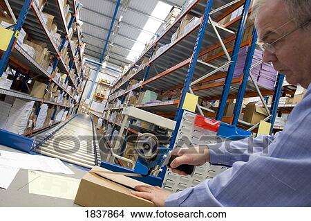 Picture - Warehouse worker. Fotosearch