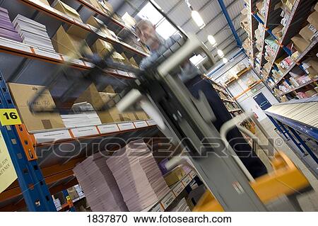 Warehouse worker View Large Photo Image Stock Image - Warehouse worker. Fotosearch