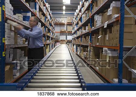 Warehouse worker View Large Photo Image Stock Photo - Warehouse worker. Fotosearch