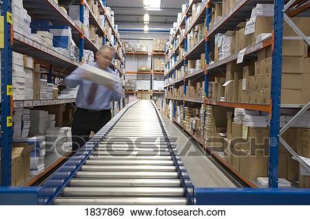 Warehouse worker View Large Photo Image Stock Photo - Warehouse worker. Fotosearch