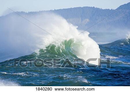 Stock Image - Waves, Cape Kiwanda, Pacific City, Oregon, USA . Fotosearch