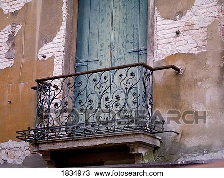 Stock Image - Weathered building and balcony, Venice, Italy. Fotosearch