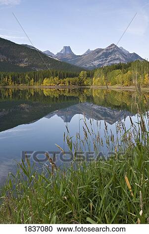 Stock Image - Wedge Pond, Kananaskis, Alberta, Canada; Canadian Rockies during Autumn. Fotosearch