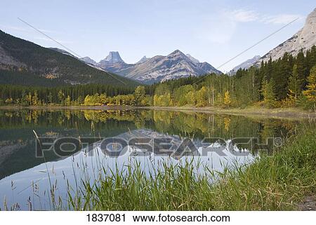 Stock Image - Wedge Pond, Kananaskis, Alberta, Canada; Canadian Rockies during Autumn. Fotosearch